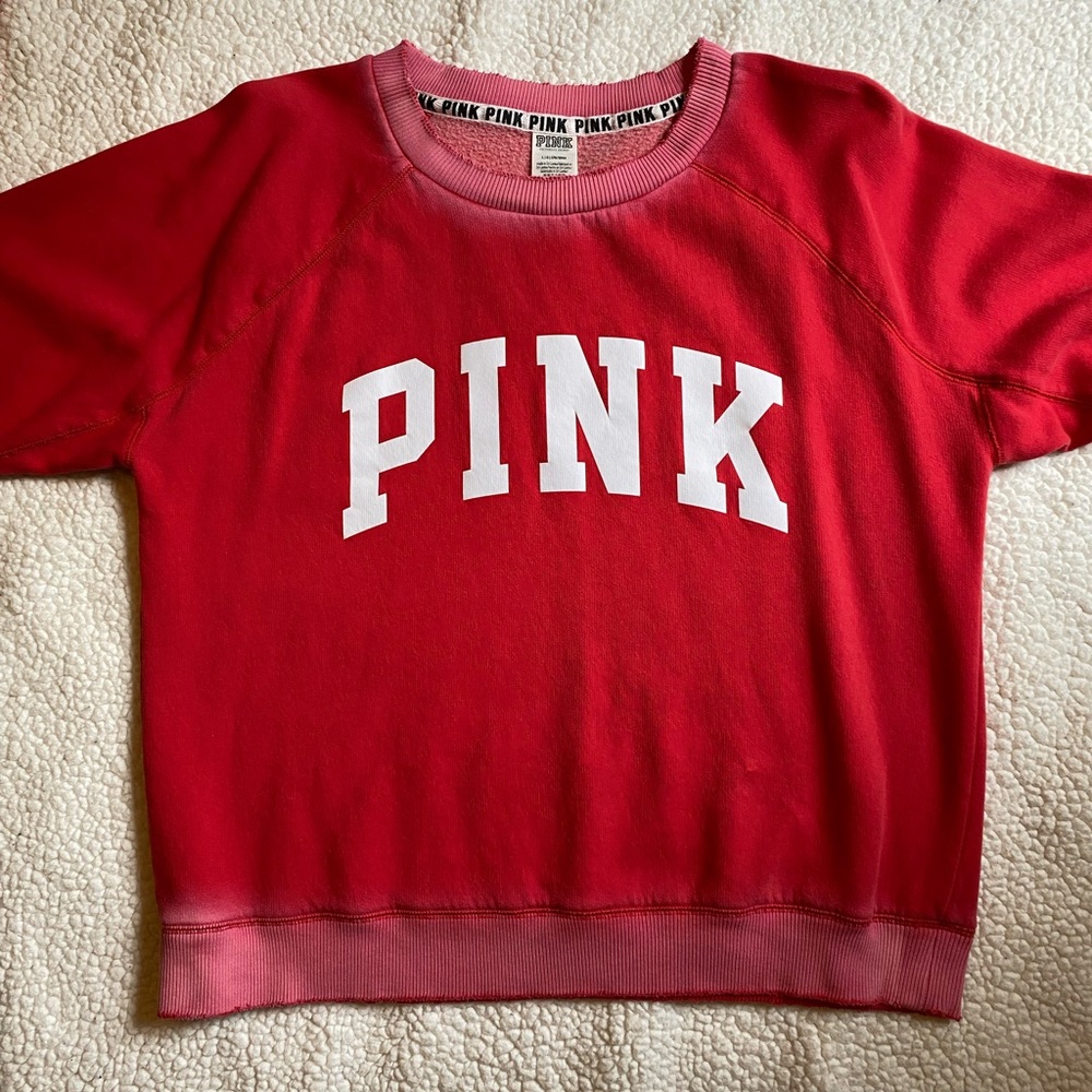 Pink Victoria’s Secret sweatshirt
